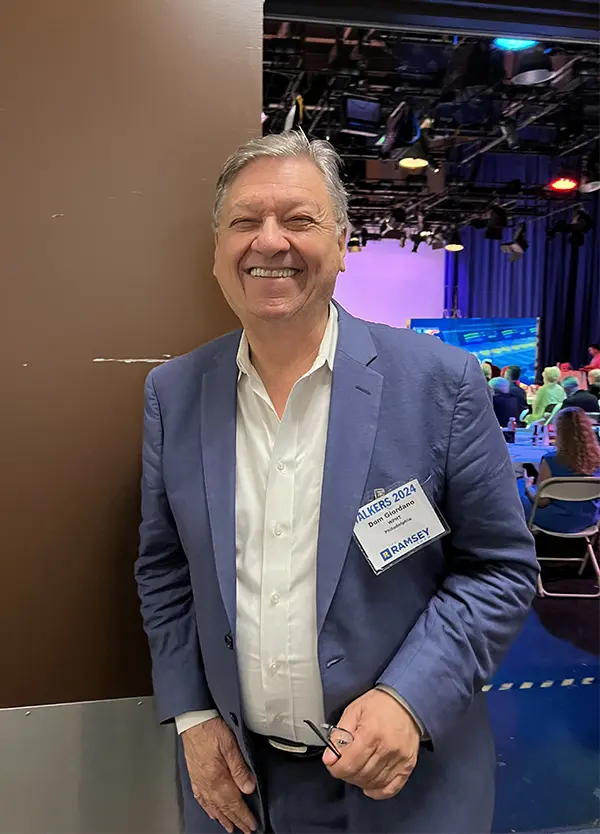 Dom Giordano smiling at a broadcasting event